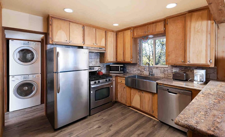 The kitchen has enough room for more than one chef with all of the things you need for a gourmet meal