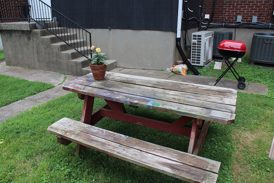 Picnic table and grill available for use