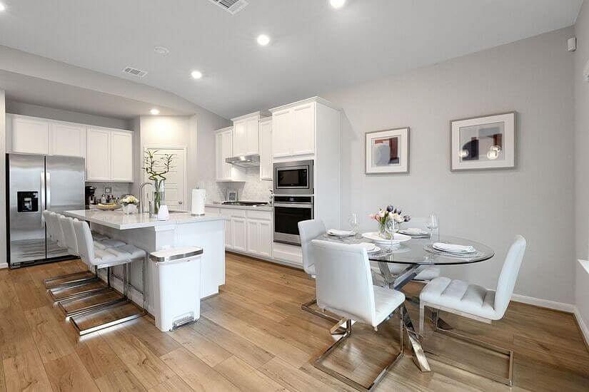 Bright dining nook and bar for casual meals or coffee breaks.