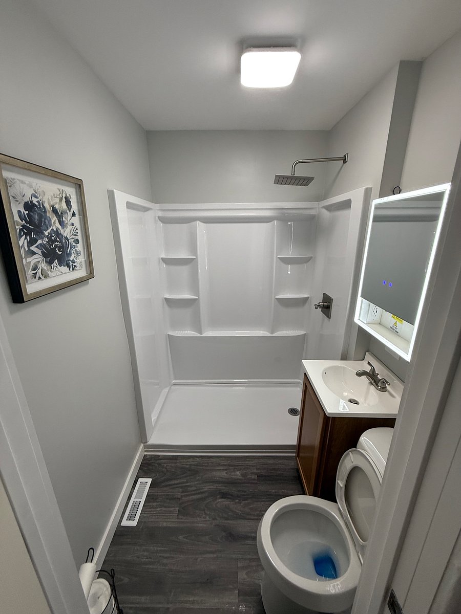 Note: This picture was taken before the shower panel was installed. You can see the panel in a previous photo.