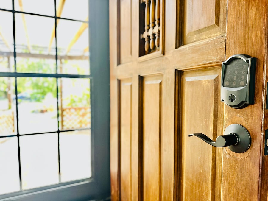 Keyless entry at the front door, and a lovely glass storm door to allow in extra light. Storm door windows drop open for fresh air when desired.