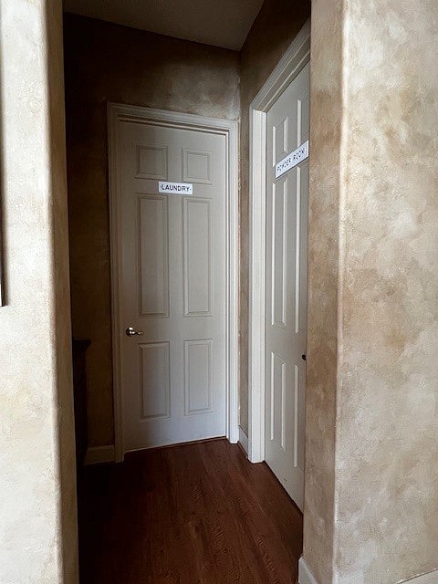 laundry room with front load washer and dryer plus 1/2 bath powder room