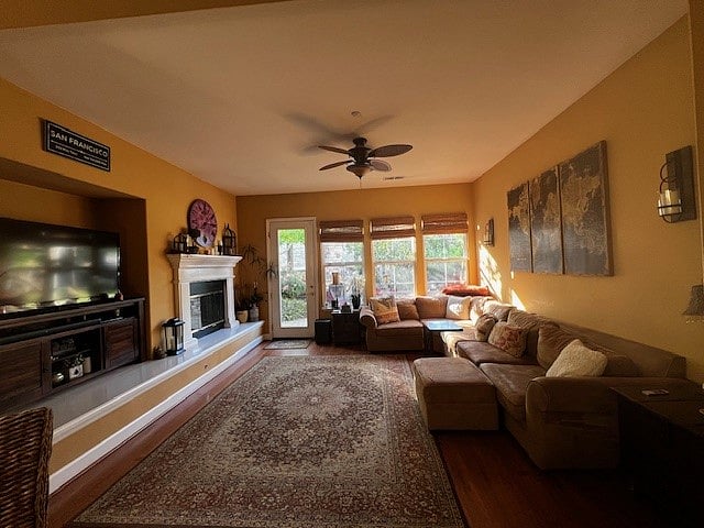 spacious family room with TV and fireplace