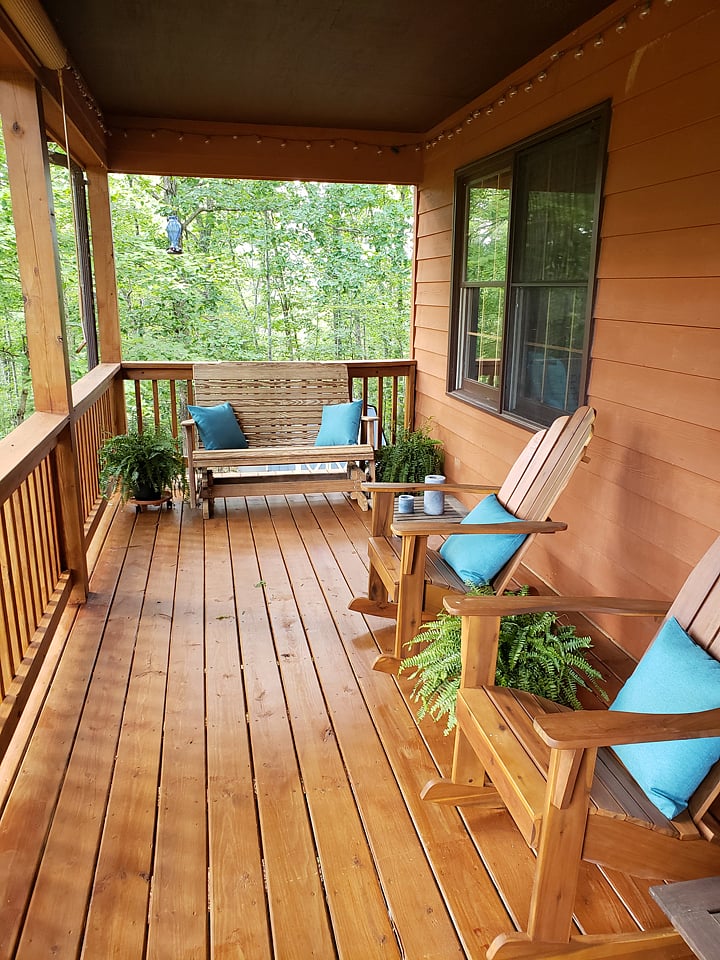 Gorgeous expansive covered front porch with a view of the Blue Ridge Mountains. You can even see Humpback Rock!