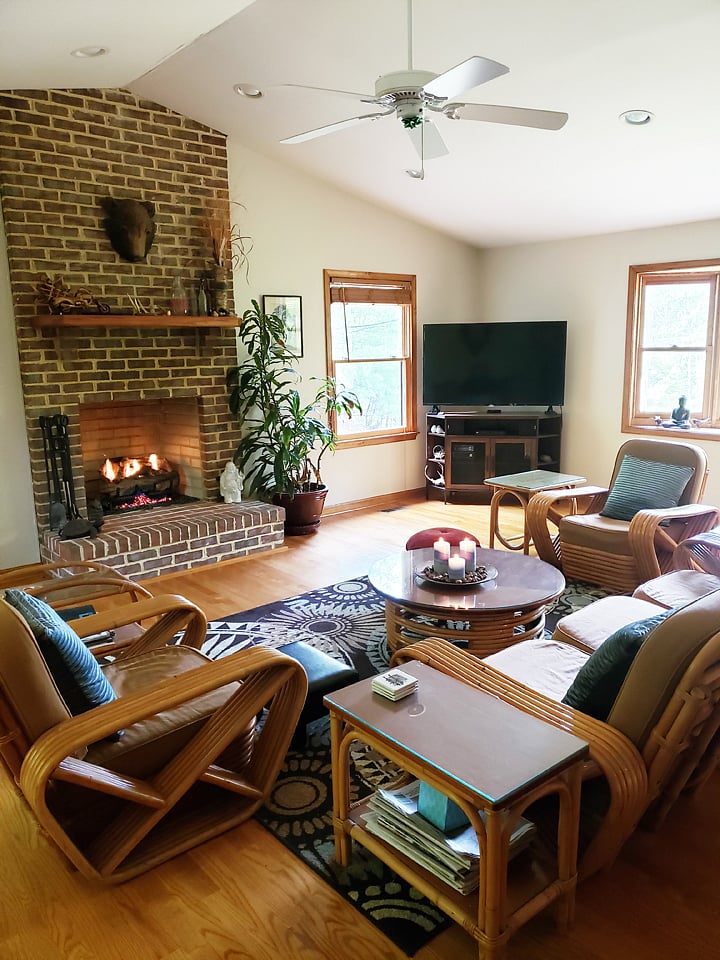 Spacious living room with gas fireplace and smart TV.