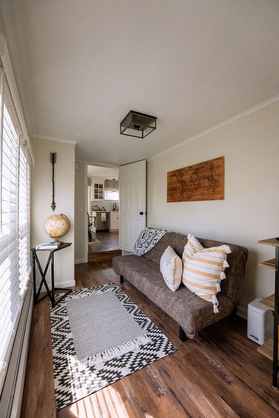 spare bedroom serving as a cozy office with foldout futon