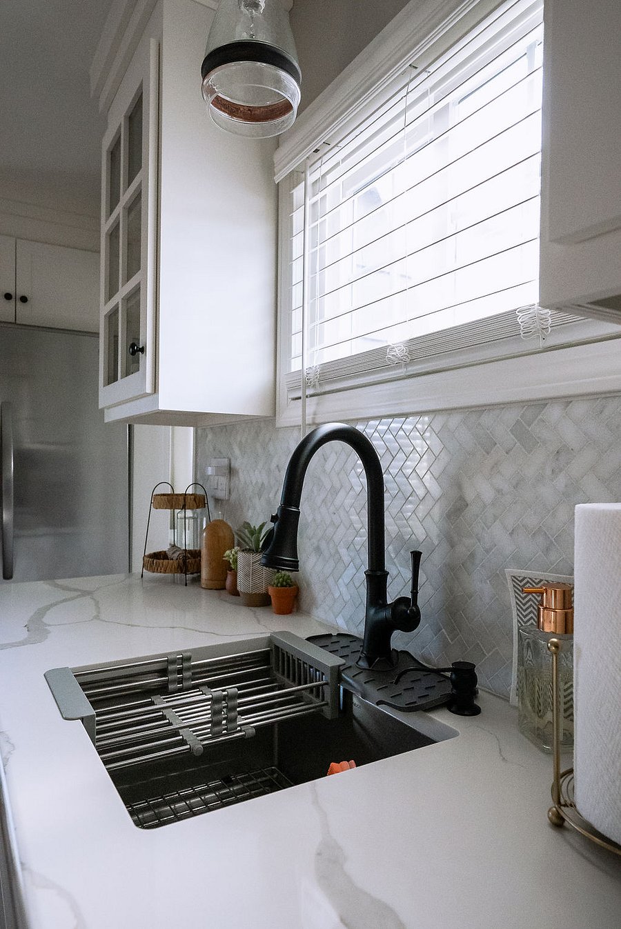 quartz countertops and modern stainless steel sink