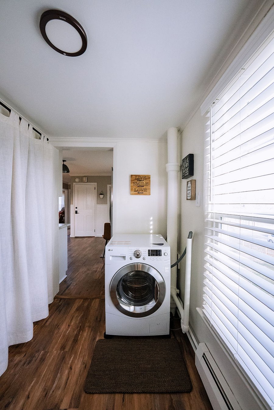 laundry room with LG washer/dryer combo