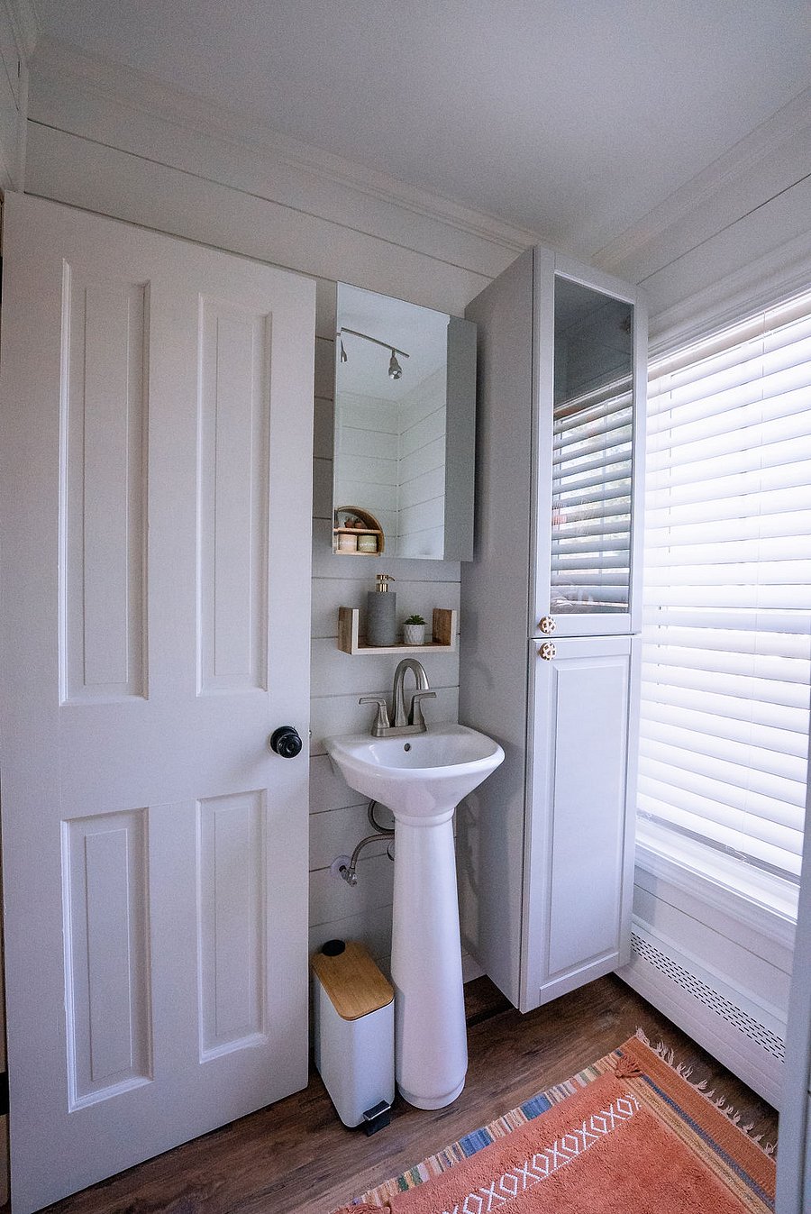 well-lit and fully-stocked bathroom