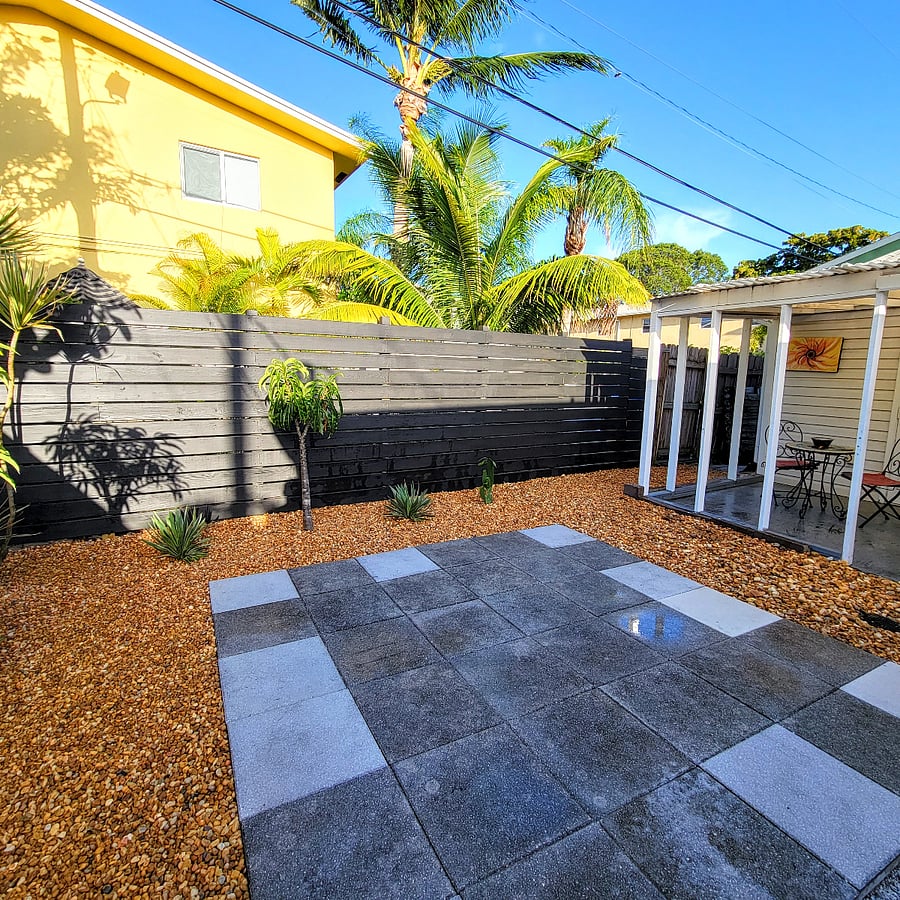 Private backyard with sun chairs for laying out. Gated and secured. Accent lights that automatically come on at night for a beautiful outdoor experience. Quiet and peaceful. 