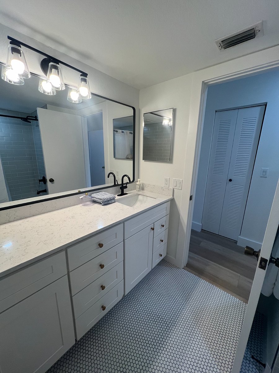 Owner suite bathroom with shower / tub