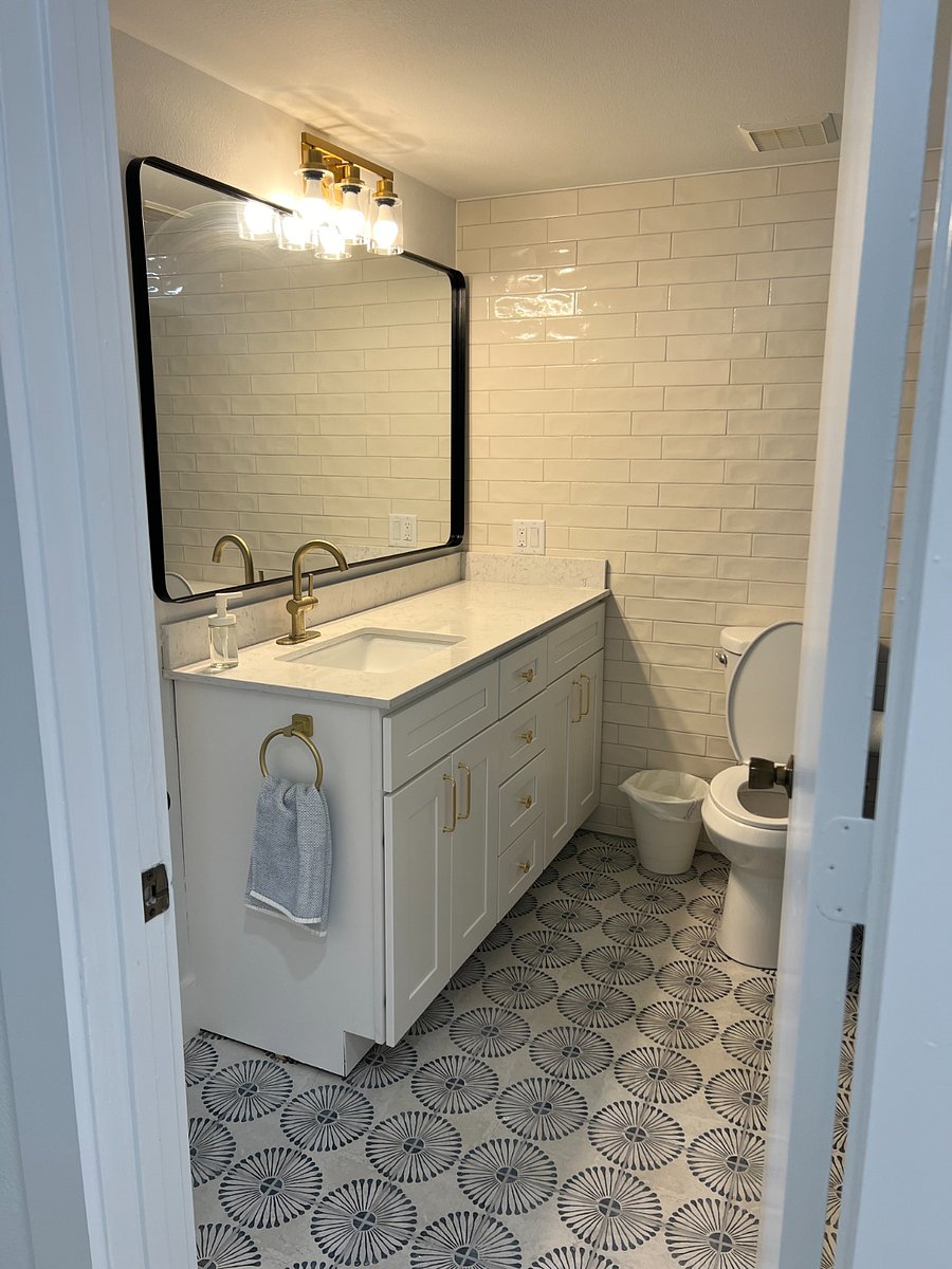 First floor full bathroom with tub / shower. Connected to room and hallway.