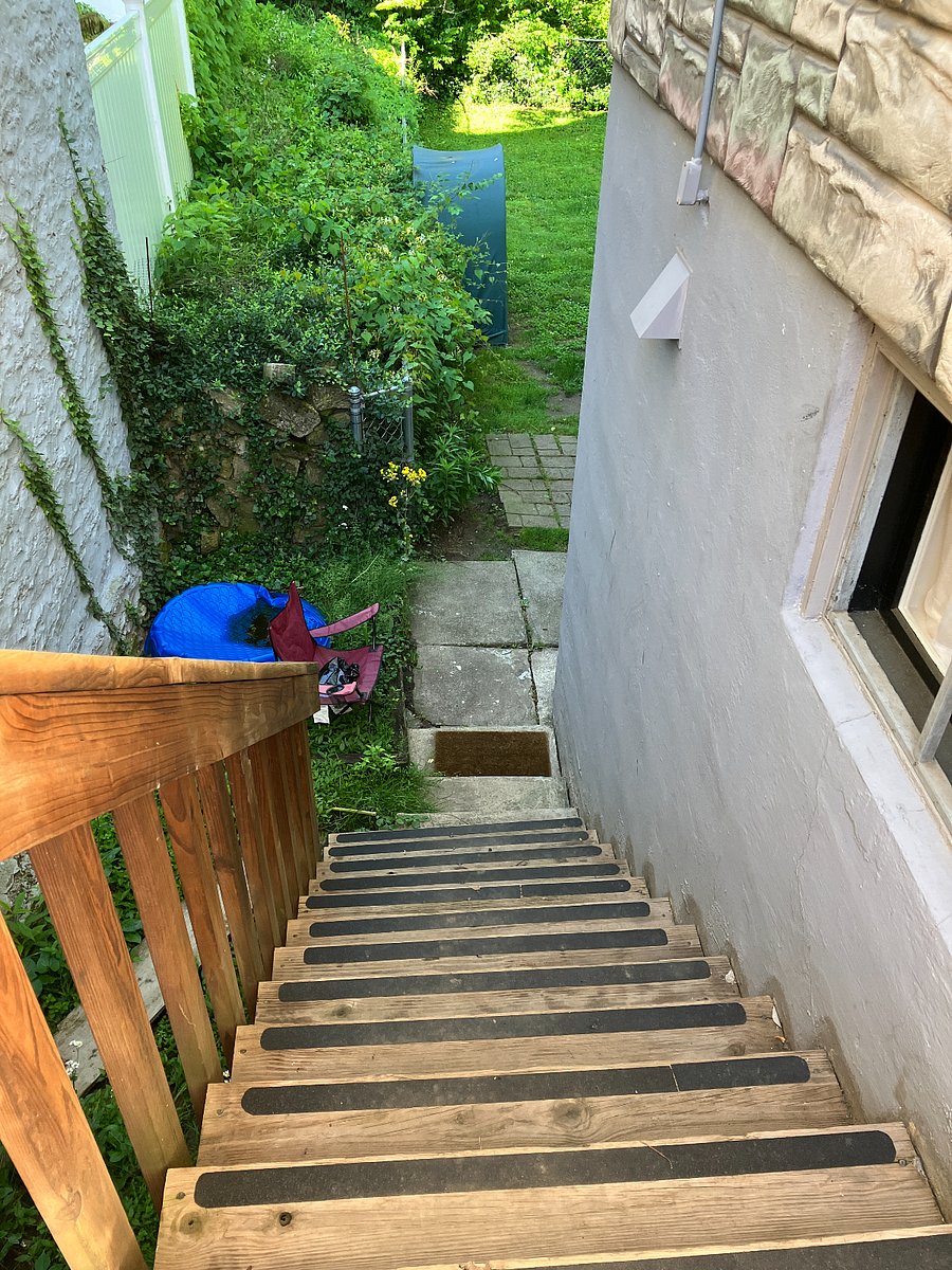 Many steep stairs but they've been recently pressure washed and have sticky strips on them. They are lit all the way down with solar lamps.