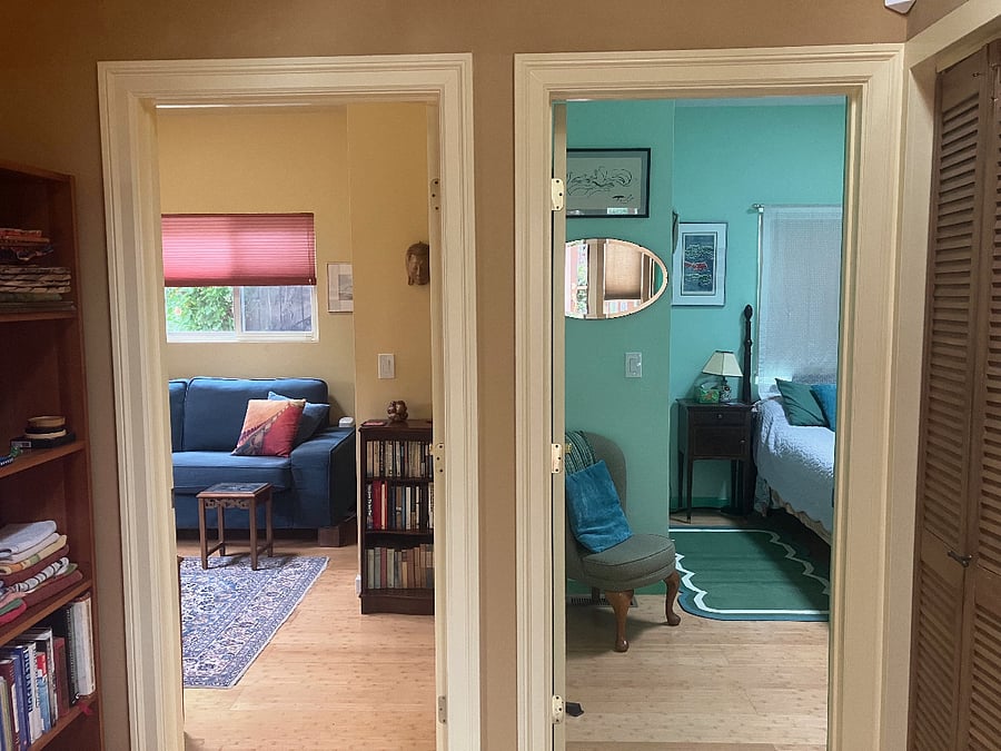 View from entry room of living room and bedroom