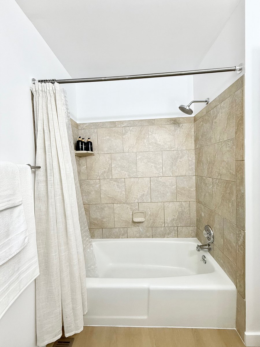Full bathroom with tub.