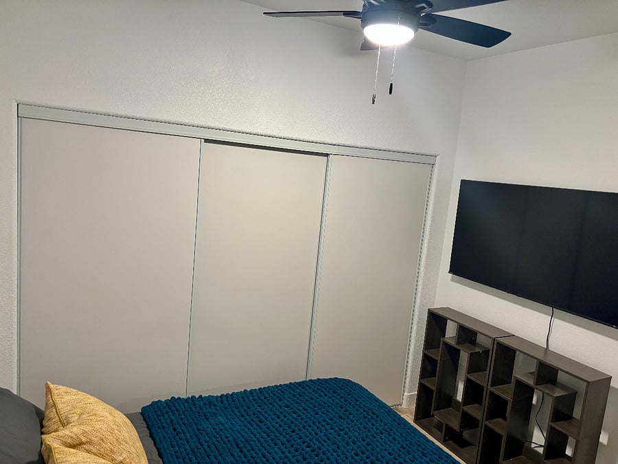Spacious closet and ceiling fan