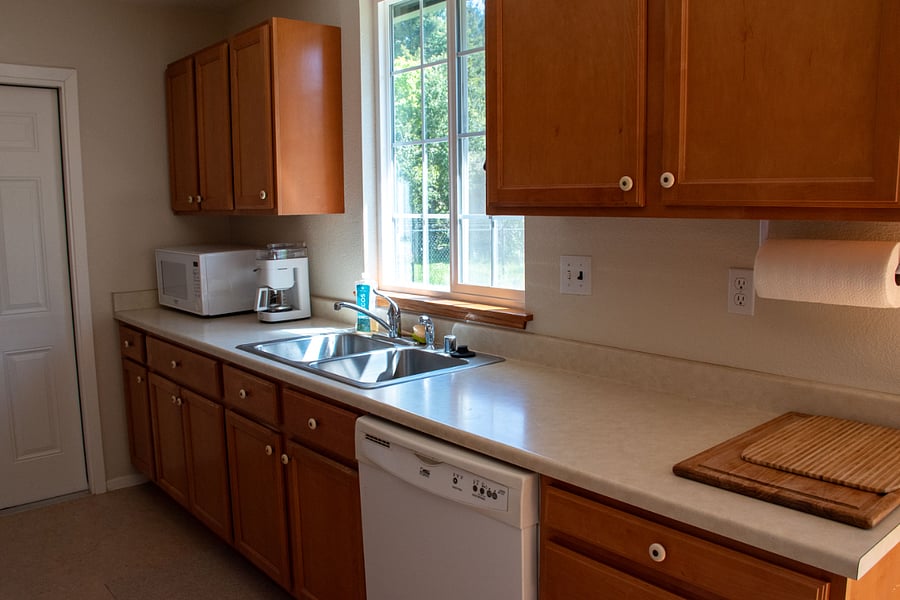 Kitchen microwave, coffee maker, dishwasher.