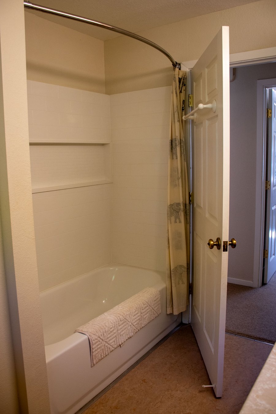 Porcelain/cast iron tub and shower combo.
