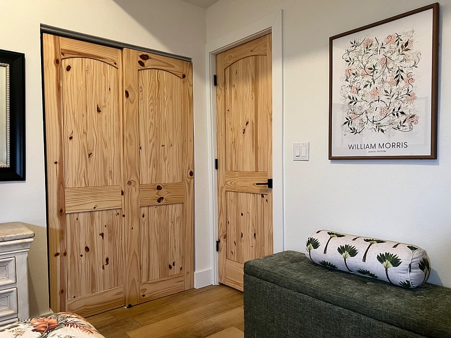Natural pine wood doors provides an earthy feel throughout. 
