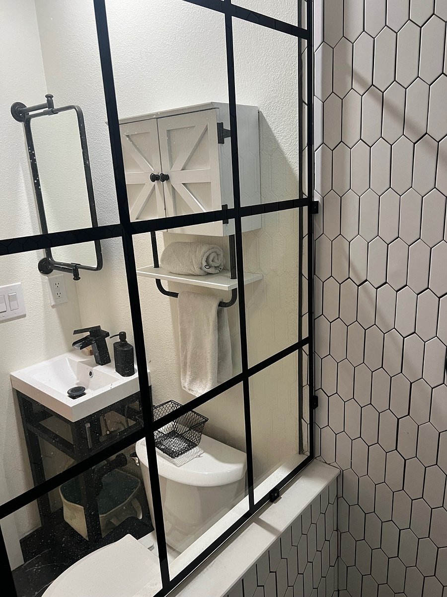 Attractive paned glass window to walk-in shower.
