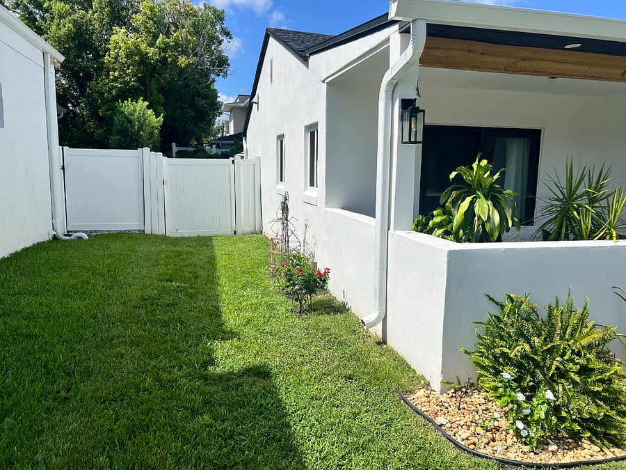 Secure fence and gate to allow your pets to play in a safe space. 