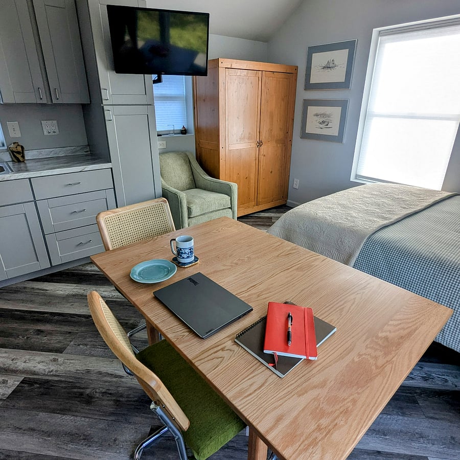 Fold out table for extra work space or more room for a guest!