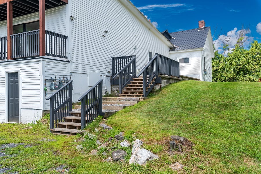 Steps from parking to side entrance