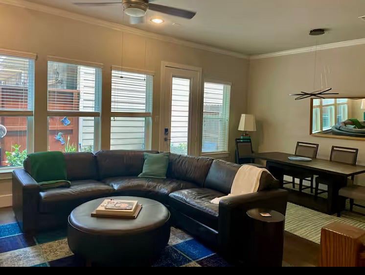 100% Italian leather sofa, 64 in Amazon Fire television with basic cable, patio off back