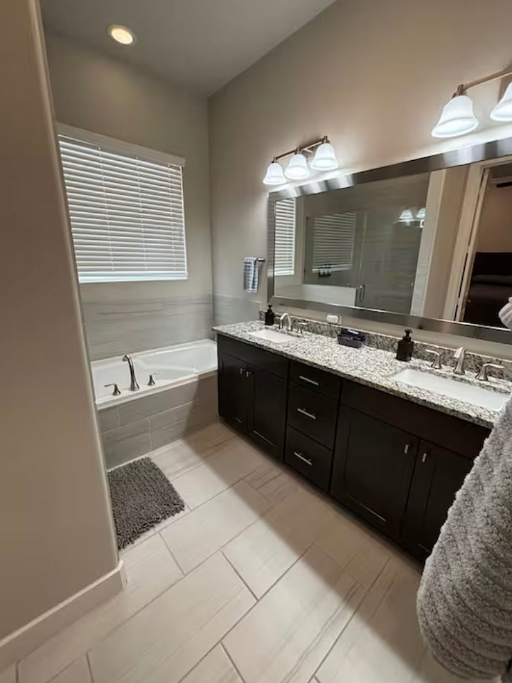 Master bathroom has soaking tub, separate large shower, and extra large walk in closet
