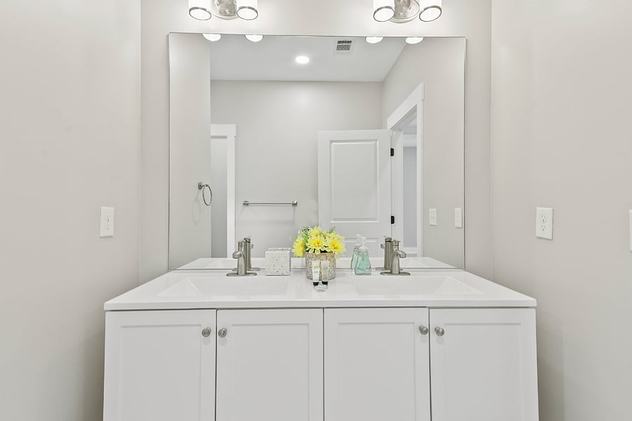 No more fighting for mirror spacethis double-sink setup keeps the peace.