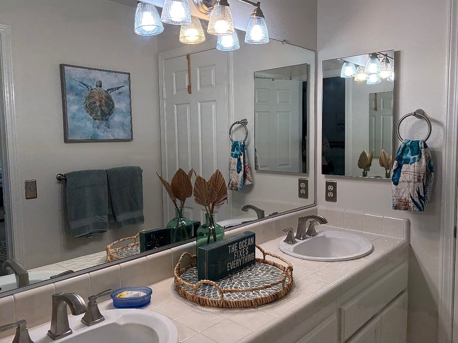 Jack & Jill bathroom connecting bedroom 2 and 3. Separate shower/tub and toilet room.