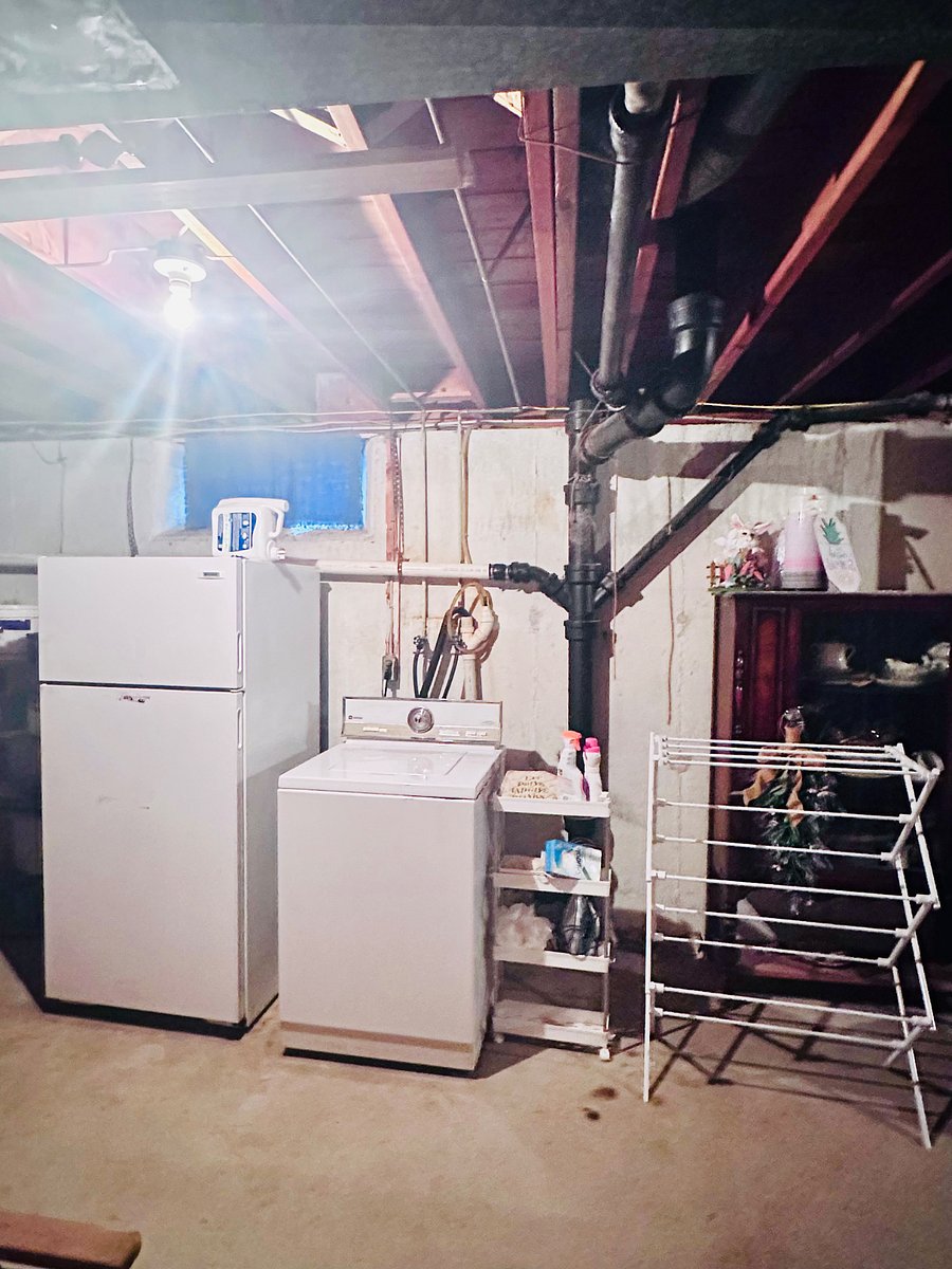 Second refrigerator to keep your overflow goodies and washing machine in basement.