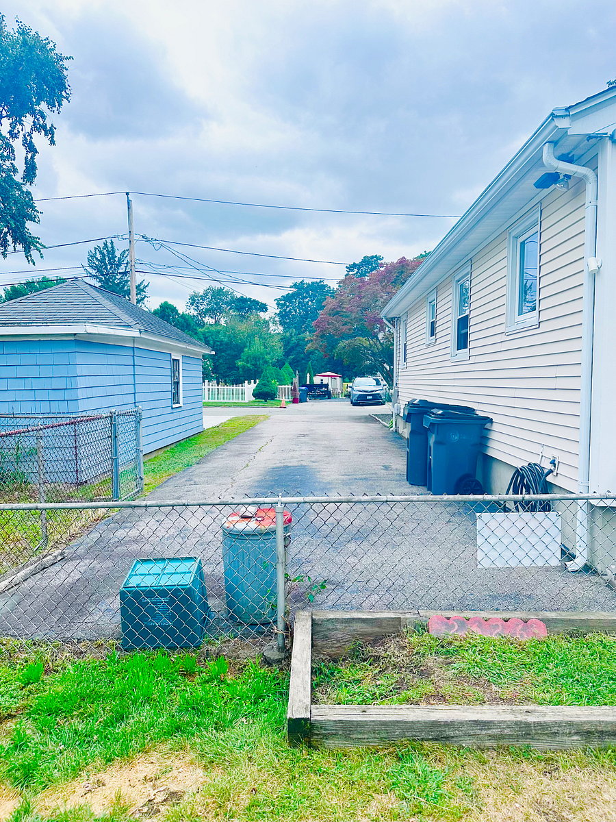 Private driveway comfortably fits up to three vehicles. 