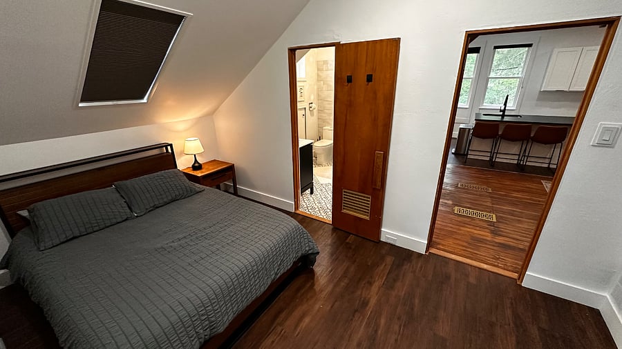 Ground floor bedroom with queen bed and ensuite bathroom.