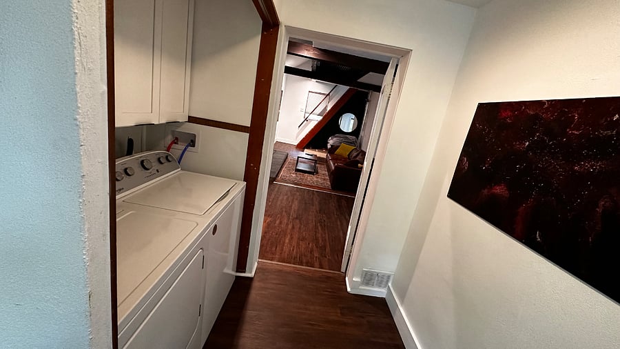 New washer dryer in entryway.
