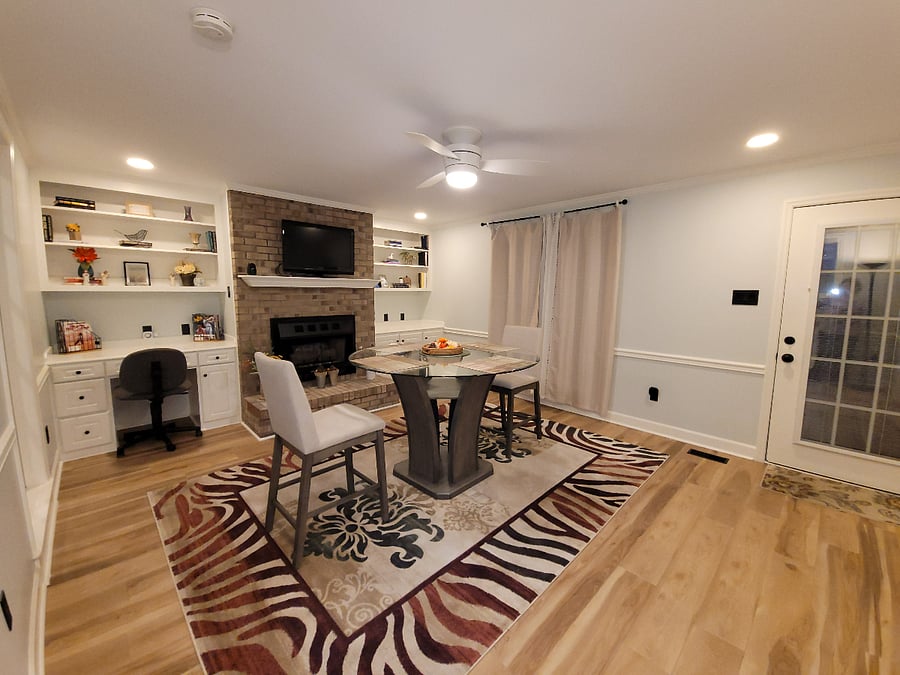 Den / bonus / flex room with fireplace desk can be used as a study/office area