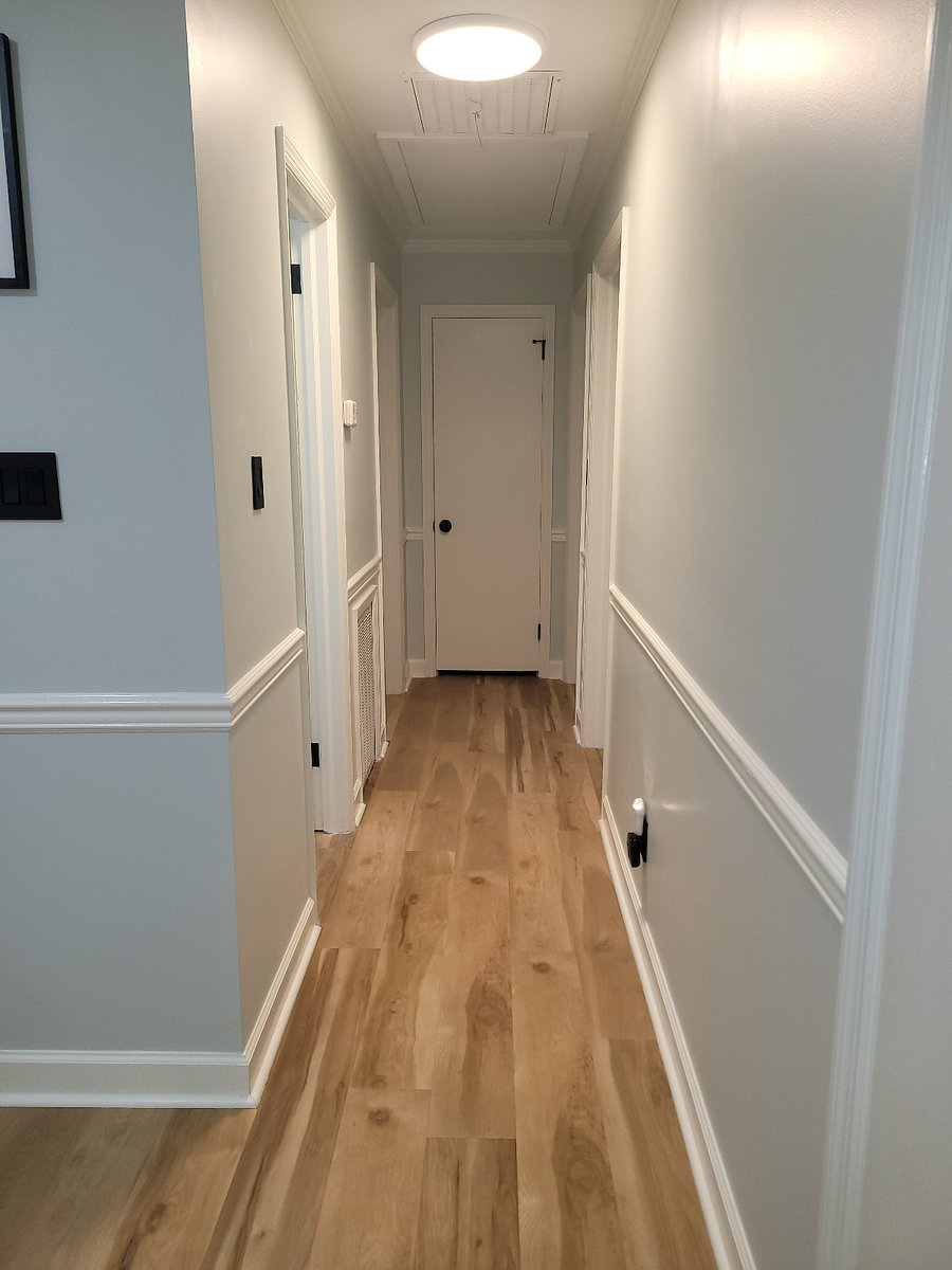 Hallway leading to bathrooms, 3 bedrooms