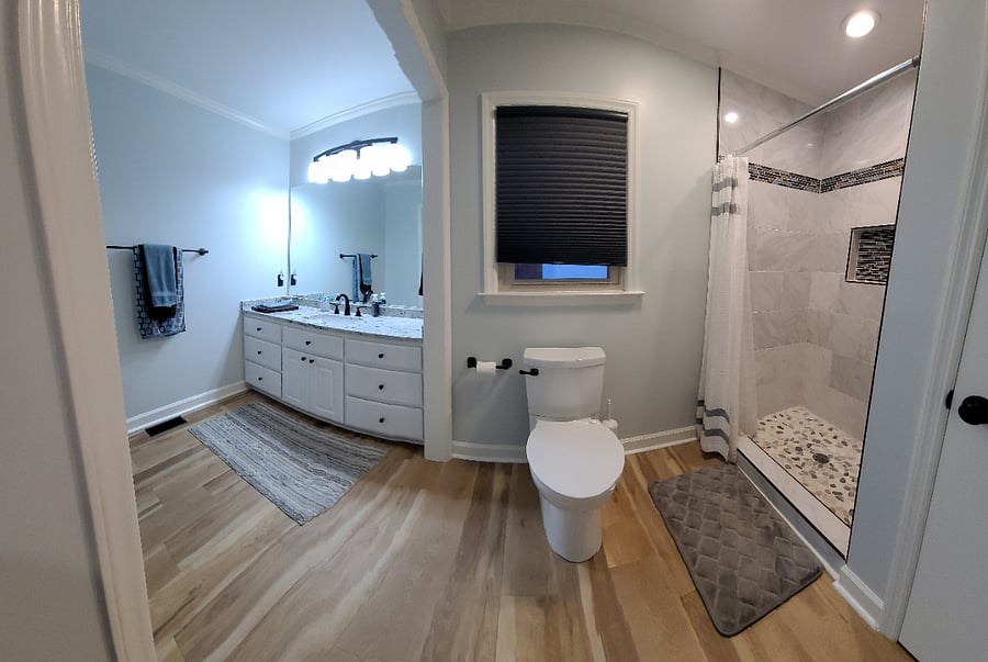Master bathroom with double vanity, linen closet, plenty of storage area
