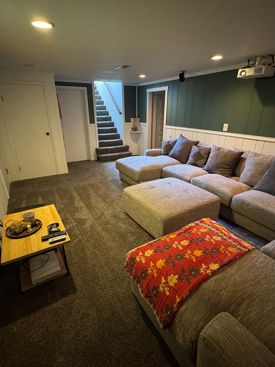 Downstairs entertainment room. There will be a different couch, not the one pictured.