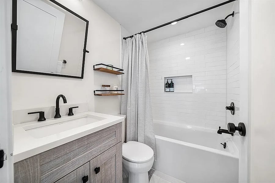 Full restroom for BR #2, features high end Duravit fixtures including a castiron tub.