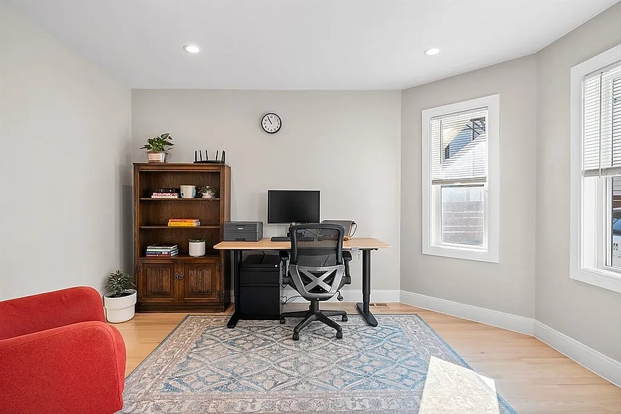 Bedroom #2 is staged here as an office, but now features a queen bed.