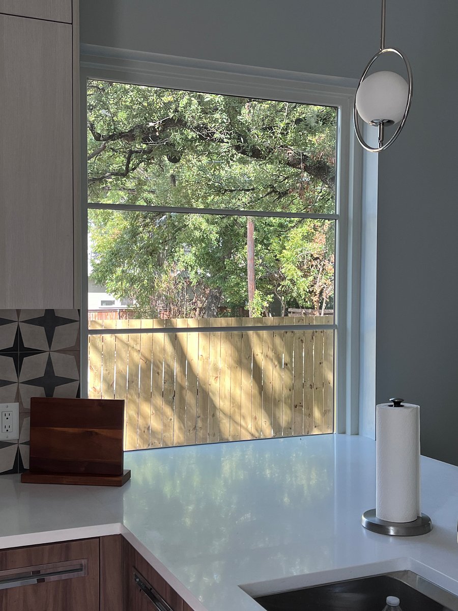 View from the kitchen of the enclosed private yard.