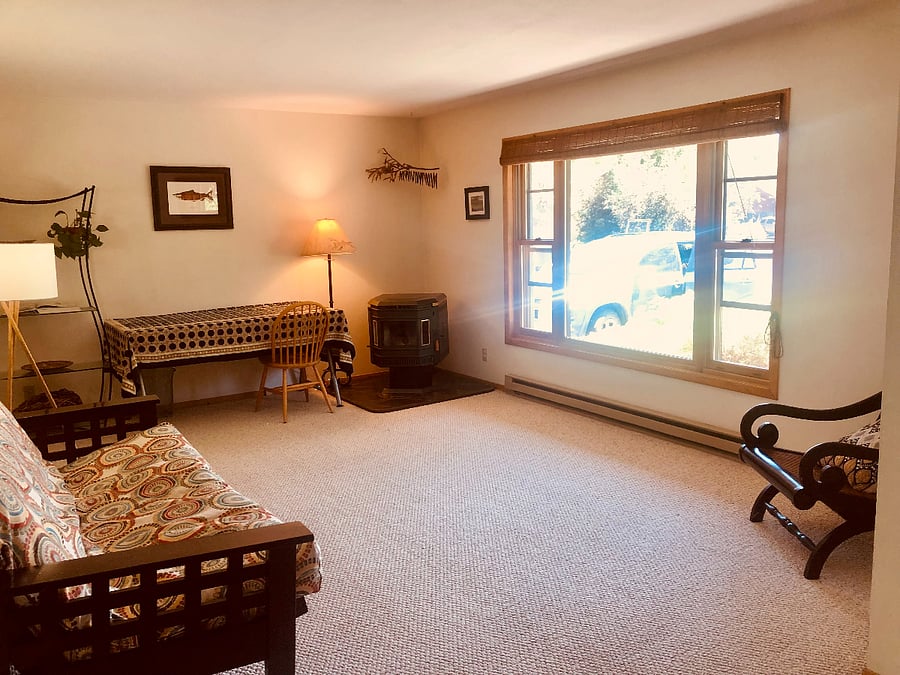 Front living room with desk. great south facing light.