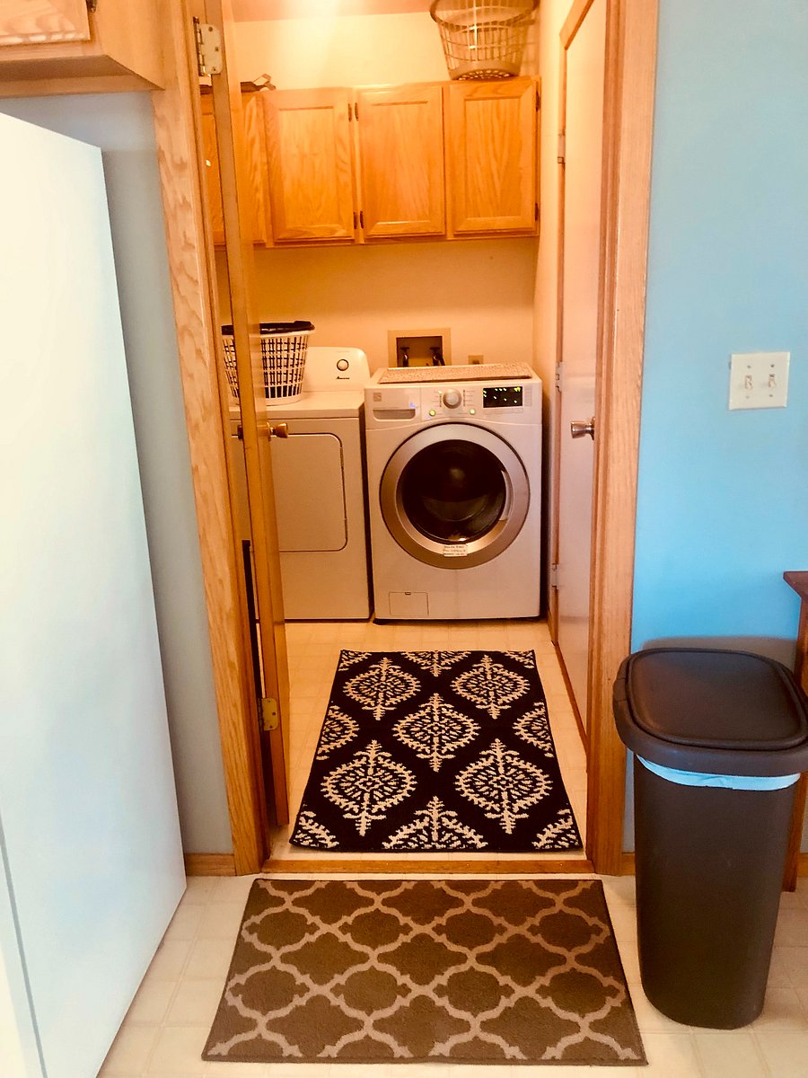 Washer, dryer and pantry off the kitchen, opens into the garage.