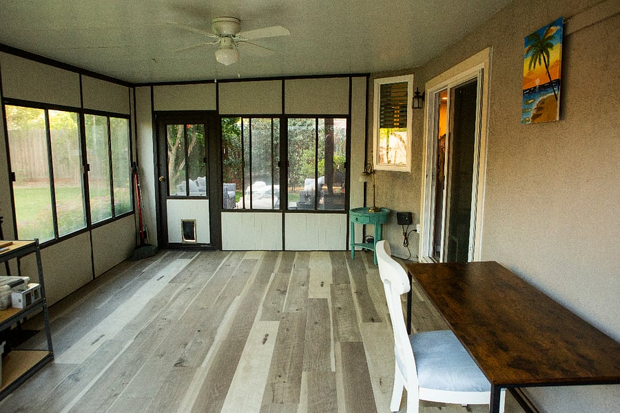 Sunroom/craft room outside of exterior door to backyard