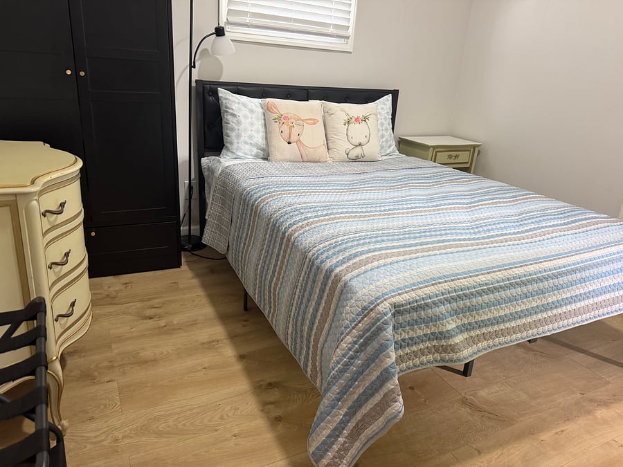 1st floor bedroom. Queen bed. Washer dryer sits off bedroom in closet.