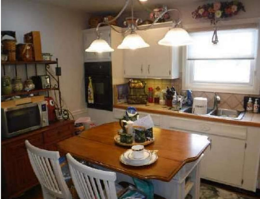 Shared kitchenn, stainless appliances, washer/dryer closeted in the kitchen.