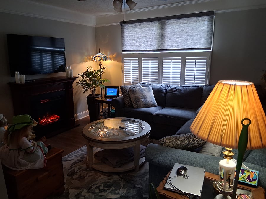Den/office area. Den is very cozy, when I and the dogs in KY, we practically live in this space. Ceiling fans in den and office area (1 in each area). Office area leads to screened porch. Electric fireplace. Laminate flooring in Den, ceramic tilenin office.