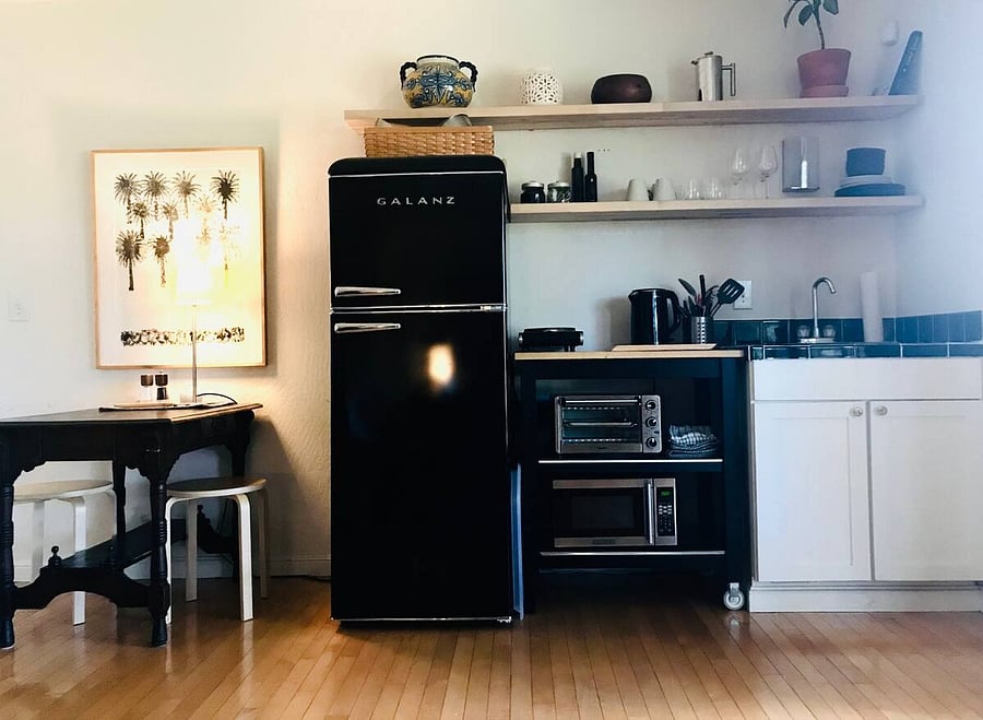 Kitchenette includes full size refrigerator, microwave, 2-burners and all necessary kitchenware.