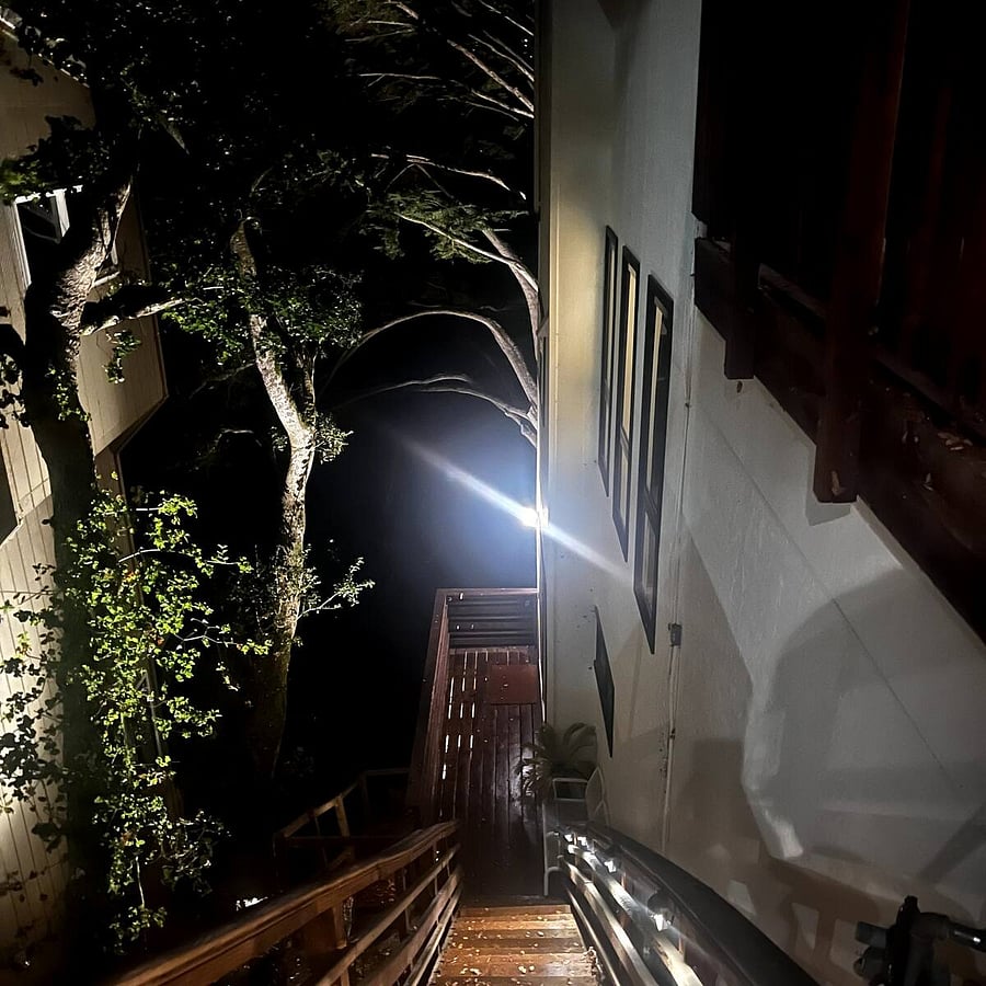 Stairs to unit. Exterior well lit.